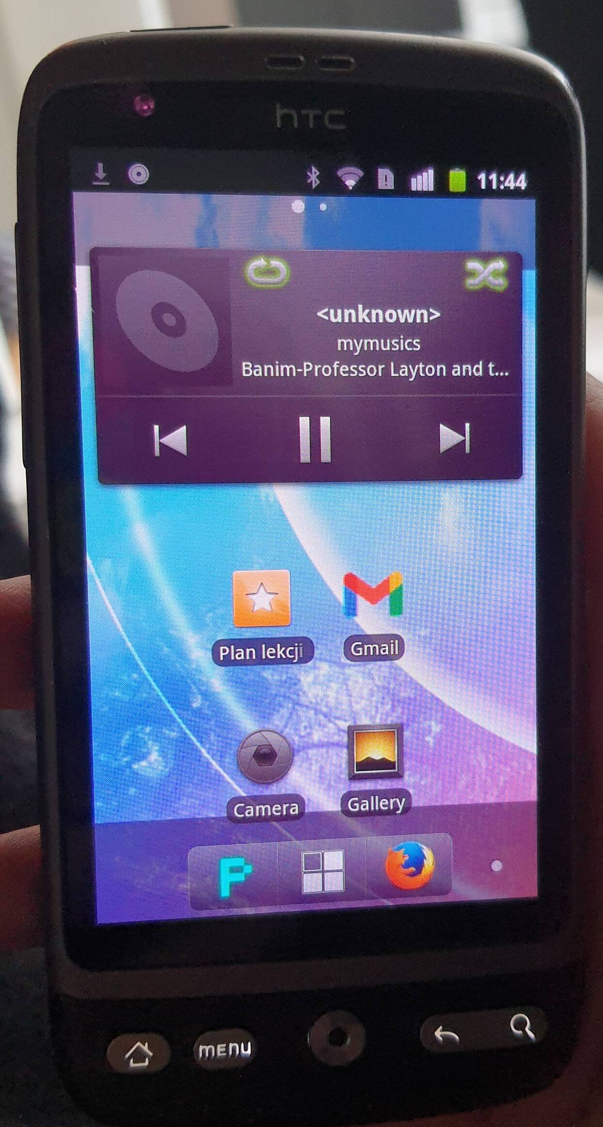 The phone's lockscreen. It has a wallpaper with Shadow the Hedgehog
